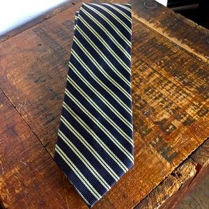 The young men shop vintage dark blue striped tie